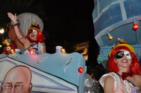 Float riders in Krewe of Muses parade
