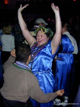 At krewe Mardi Gras celebrations, the dress code and style of revelry reflect the ethos of the krewe itself.