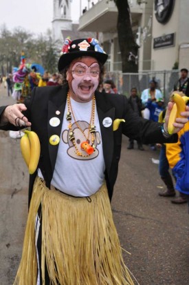 Banana regalia, props, songs and libations are key to the krewe’s tropical aesthetic.