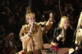 Drew Brees, as Bacchus XLII, and his wife, Brittany, offering a toast on Canal Street in the 2010 Bacchus parade, amid an ecstatic love fest for the ages in the wake of the Saints quarterback having led his team to its first Super Bowl title.