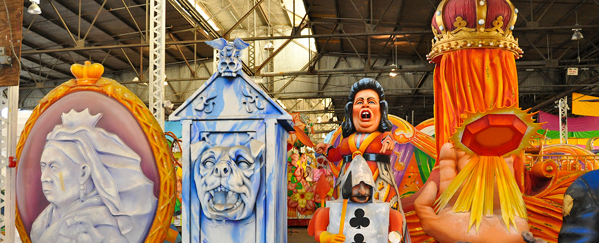 Sculptural props, including a large representation of Queen Victoria, displayed at Mardi Gras World in New Orleans.