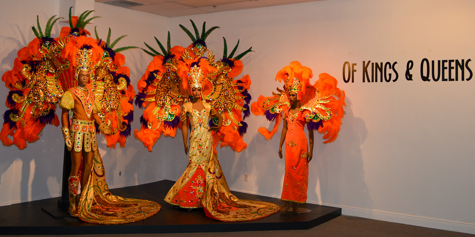 Display of matching Mardi Gras king and queen regalia at the Mardi Gras Museum of Costumes and Culture